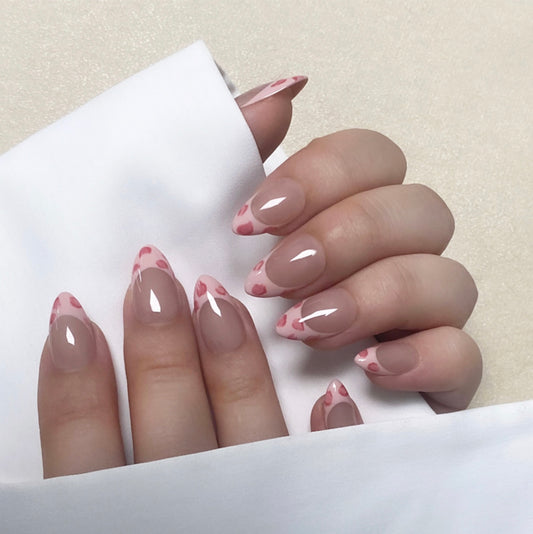 Cute Leopard is a reusable handmade press-on nails set by Leme. These high-quality nails feature a short almond shape with a chic pink leopard pattern and elegant French tips. The nude base enhances the design’s sophistication, making them perfect for a stylish, polished look.