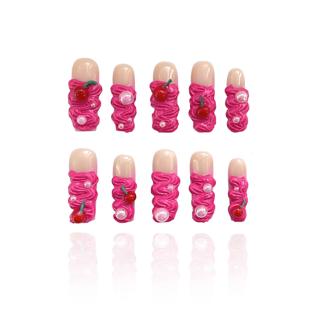 Cherry Bomb is a reusable handmade press-on nails set by Leme. Elevate your manicure with the Cherry Bomb from our Candy Cream Collection. These long square-shaped, 3D press-on nails feature a creamy texture in vibrant hot pink, adorned with delicate cherries and pearls. Handmade with high-quality materials, they offer a reusable and durable option for a flawless, expert finish every time.