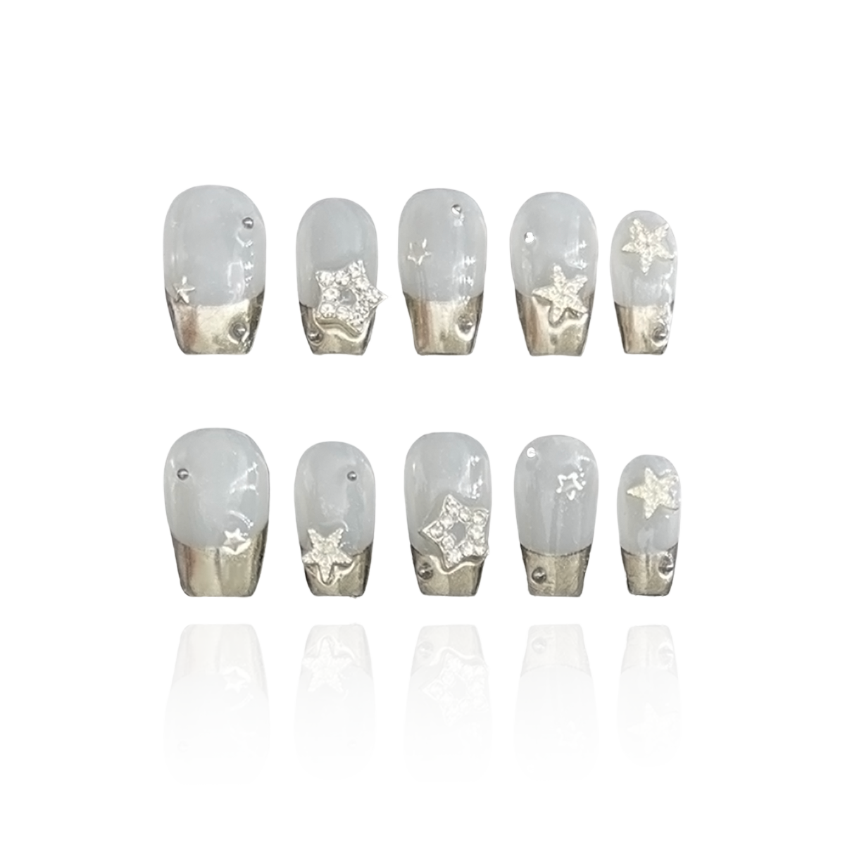 Twinkle is a reusable handmade press-on nails set by Leme. Elevate your manicure with Twinkle, featuring a chic short coffin shape and elegant silver chrome French tips. Adorned with shiny silver stars, this high-quality design offers a sophisticated sparkle perfect for your fingertips.