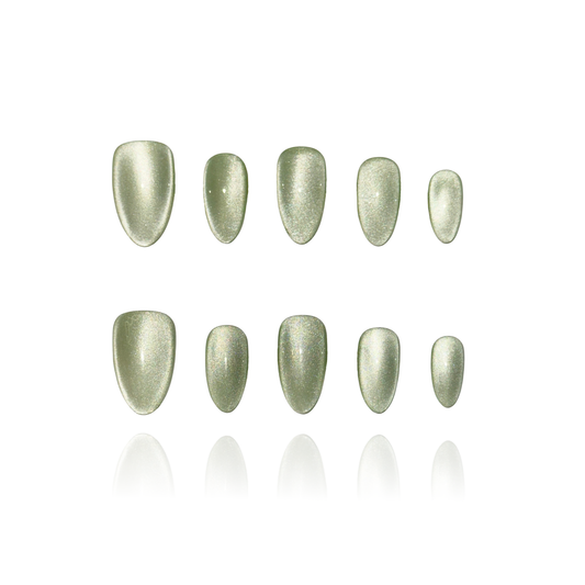 Apple Cider is a reusable handmade press-on nails set by Leme. Embrace the season with Apple Cider, our fresh spring collection featuring a stunning apple green fine cat-eye finish. Each set showcases multiple nail shapes to suit your style—from classic almond to bold square. Handcrafted with premium quality materials, these reusable press-on nails deliver a flawless, salon-finish look in seconds. Perfect for adding that effortless, cute spring vibe to any occasion.