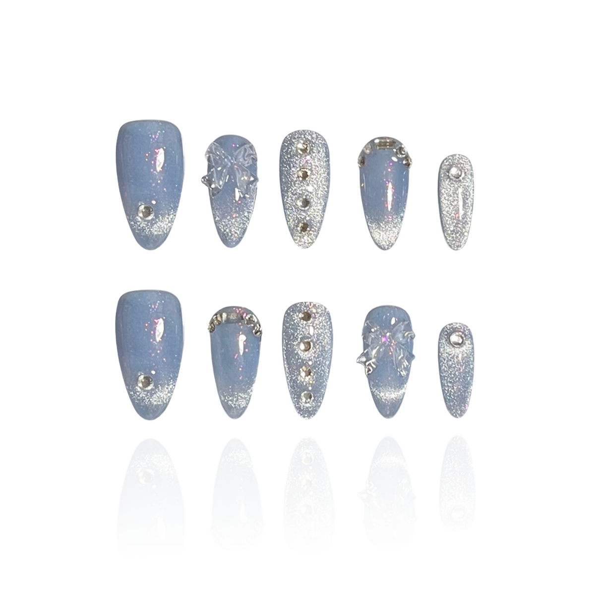 Azure is a reusable handmade press-on nails set by Leme. Elevate your style with the Azure nail design featuring a high-quality blue cat-eye base that delivers a captivating 3D effect. The medium almond shape enhances elegance, while delicate small diamonds and bowtie decorations add refined sparkle and sophistication for a polished, expert finish.