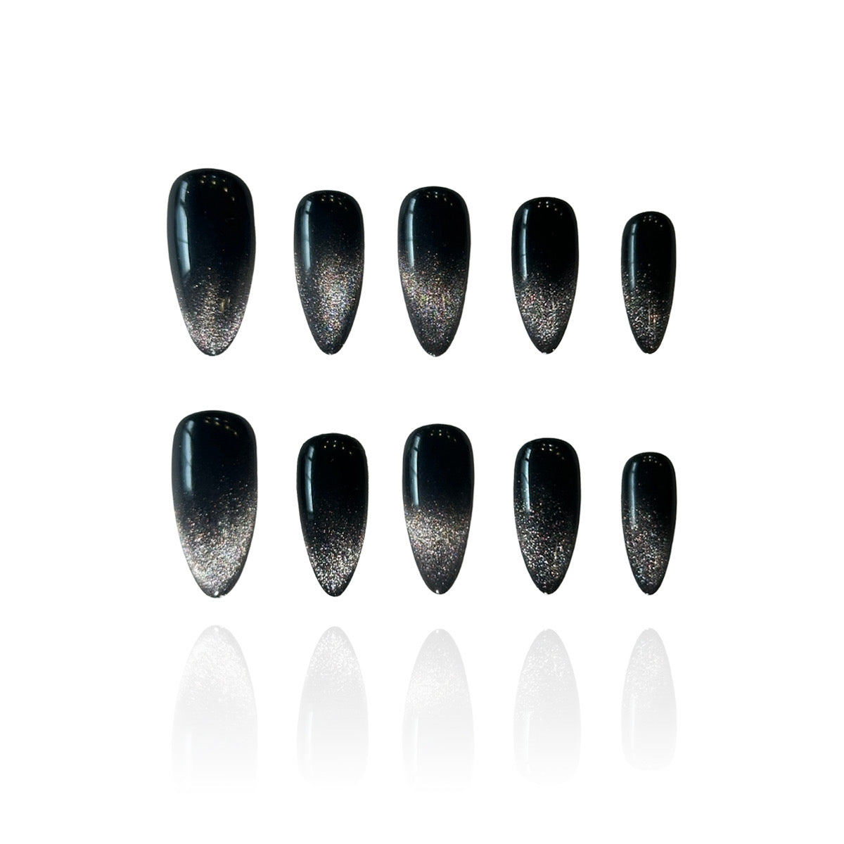 Black Stardust is a reusable handmade press-on nails set by Leme. Transform your nail aesthetic with these exquisite black stardust nails, expertly designed with a medium almond shape that elongates the fingers and creates an elegant silhouette. The deep black base is beautifully complemented by shimmering silver accents that sparkle with every movement, delivering a luxurious finish that captures light magnificently. Crafted from premium materials, these high-quality nails offer superior durability.