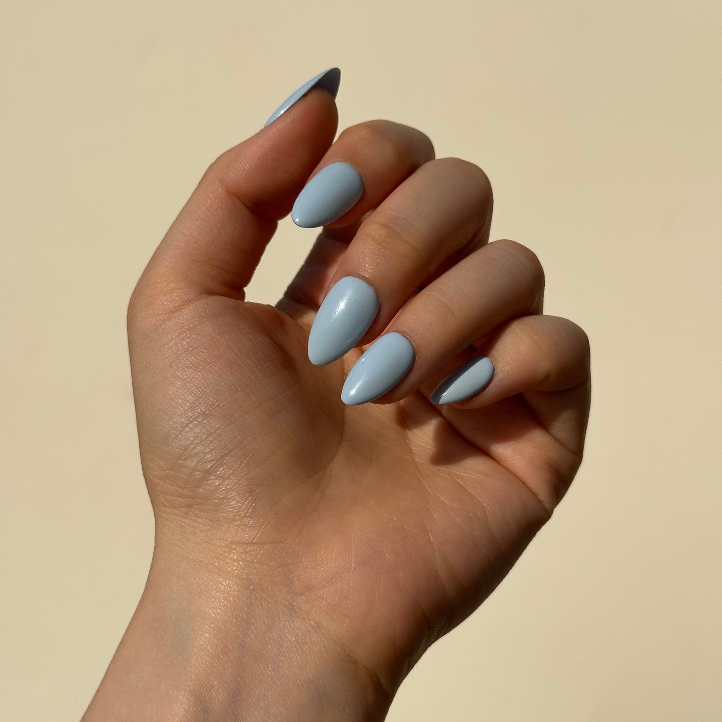 Blueberry is a reusable handmade press-on nails set by Leme. The set brings effortless elegance to your summer look. Crafted in a soft, dreamy baby blue with delicate macaron undertones, these high-quality nails feature various short shapes to suit every style and occasion. Each set is handmade for a premium finish that feels as luxurious as it looks. Perfect for those seeking a refined, understated aesthetic—reusable, comfortable, and ready to elevate your everyday beauty routine.