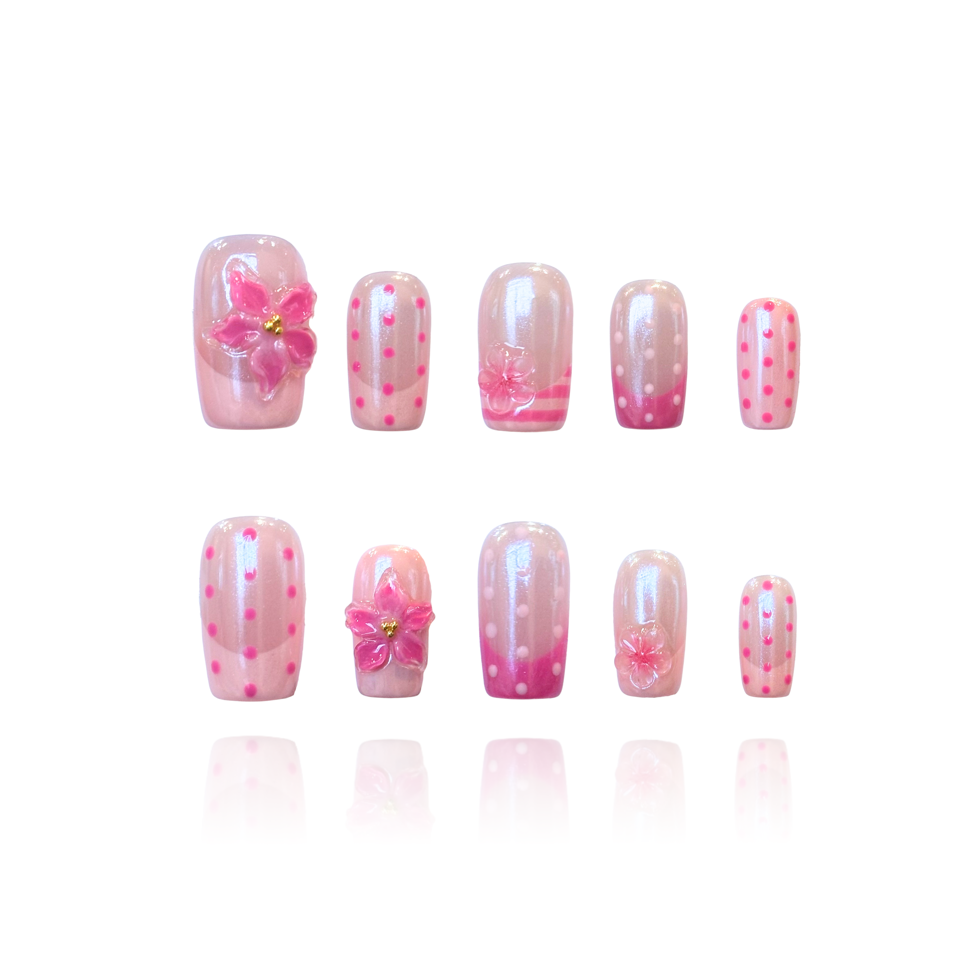 Blush Summer is a reusable handmade press-on nails set by Leme. This set brings effortless elegance to your nails with a sophisticated pink French tip design elevated by playful polka dots. Each medium square nail features two complementary pink tones that work together to create depth and visual interest. The standout detail is the 3D flower embellishment—delicate pink blooms encased in a protective layer of clear gel that gives them an icy, crystalline finish. This creates a dimensional, jewel-like effect