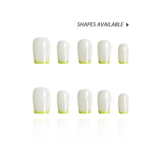 Banana Milk is a reusable handmade press-on nails set by Leme. These 2025 S/S01 5 nails feature a crisp white base complemented by vibrant neon yellow French tips, creating a striking and modern look. The set comes with multiple shapes and lengths. Crafted with high-quality materials, they ensure durability and a flawless finish, perfect for those seeking a bold yet sophisticated style. Ideal for adding a fresh, contemporary edge to any outfit.