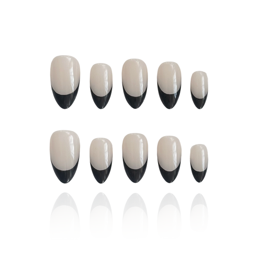 Carina is a reusable handmade press-on nails set by Leme. These sophisticated black French handmade press-on nails feature a chic almond shape, blending modern elegance with timeless style. Meticulously crafted for a precision fit and durability, Leme delivers high-quality results—no appointment needed.