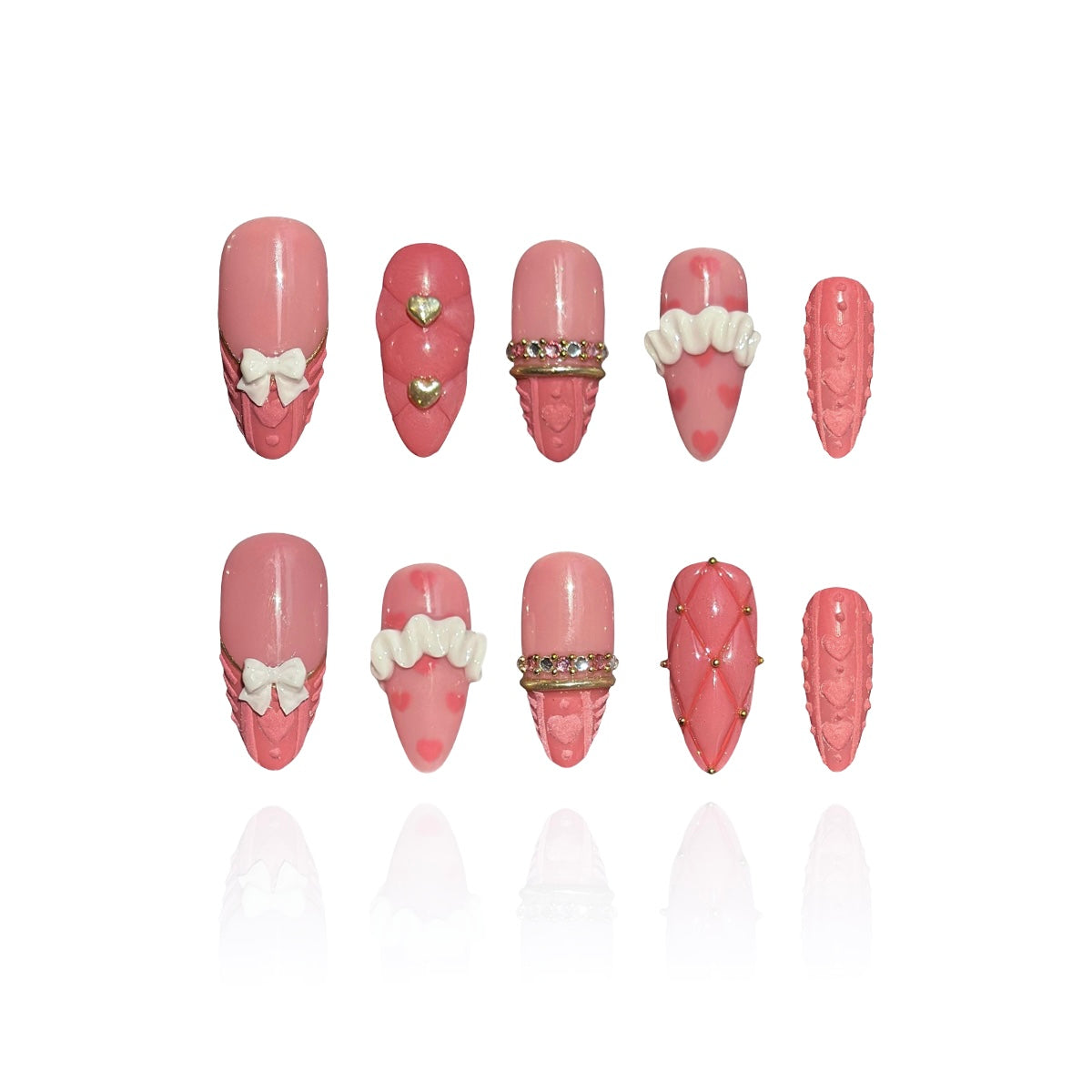 Gold Promise is a reusable handmade press-on nails set by Leme. Discover Gold Promise, an exquisite nail collection that captures timeless elegance through meticulous craftsmanship. These medium almond-shaped nails feature a romantic pink base paired with classic French tips adorned in a soft sweater texture for subtle sophistication. The design showcases premium 3D embellishments complemented by strategically placed gems and gold chrome accents that form delicate ring-like details across the nail surface. 