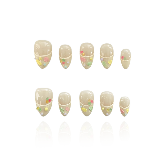 Jelly Mousse is a reusable handmade press-on nails set by Leme. Elevate your manicure with the Jelly Mousse from the Candy Cream Collection. These high-quality, 3D press-on nails feature a sophisticated short almond shape in a versatile beige shade. The unique oil paint texture adds depth and an artistic touch, delivering a professional finish with effortless application. Perfect for those seeking a refined, durable look without compromising on style.
