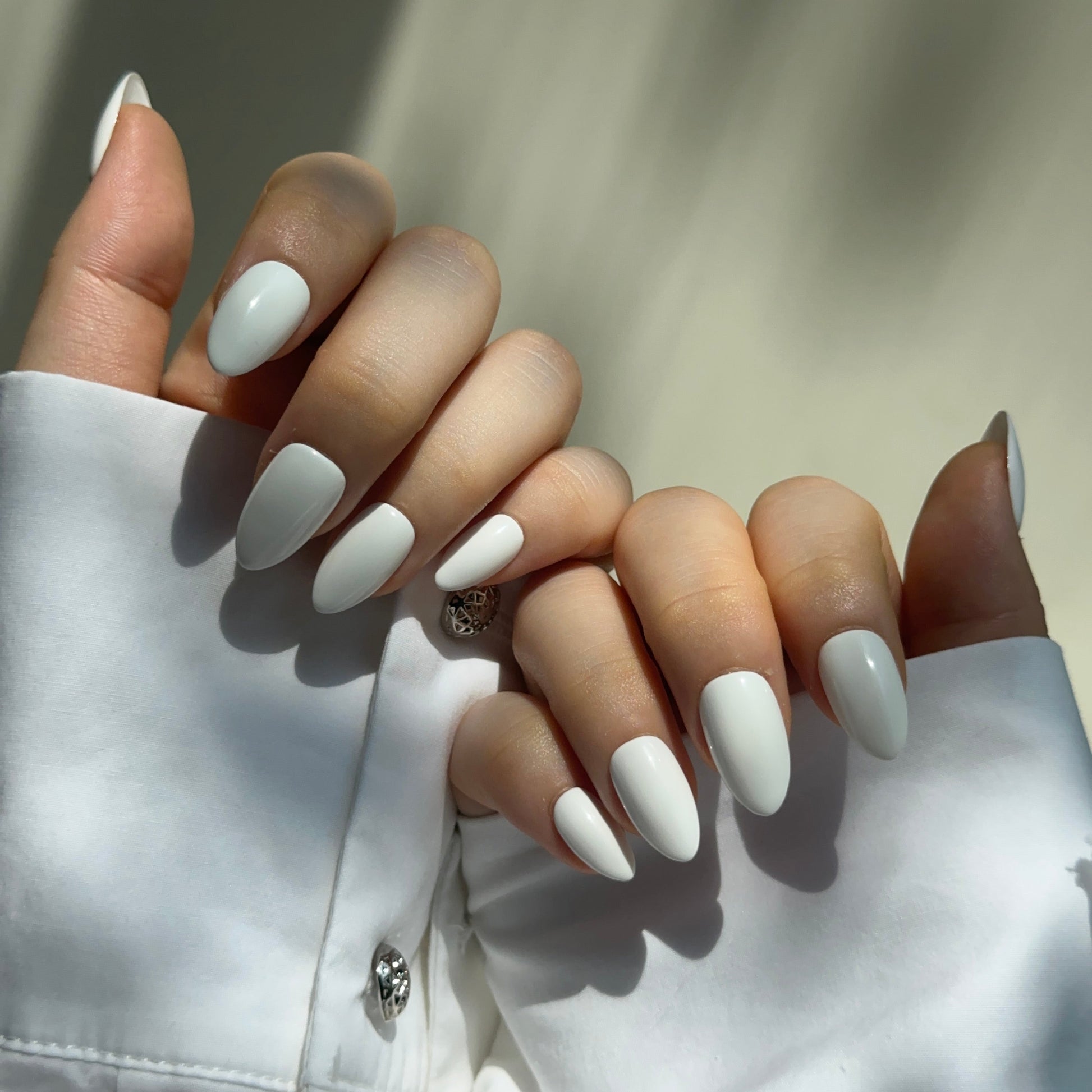 Lychee is a reusable handmade press-on nails set by Leme. The set captures the natural beauty of fresh fruit with a luminous white juicy base that evokes elegance and sophistication. Available in various short shapes, each set features our signature Macaron theme—a refined aesthetic that balances classic charm with contemporary style. Handcrafted with premium materials, these nails deliver a polished, high-quality finish that lasts. Perfect for those seeking understated luxury with a playful nod to culinary