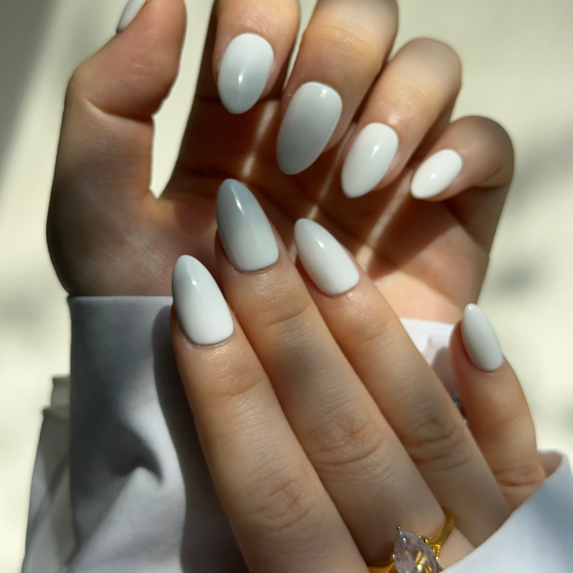Lychee is a reusable handmade press-on nails set by Leme. The set captures the natural beauty of fresh fruit with a luminous white juicy base that evokes elegance and sophistication. Available in various short shapes, each set features our signature Macaron theme—a refined aesthetic that balances classic charm with contemporary style. Handcrafted with premium materials, these nails deliver a polished, high-quality finish that lasts. Perfect for those seeking understated luxury with a playful nod to culinary