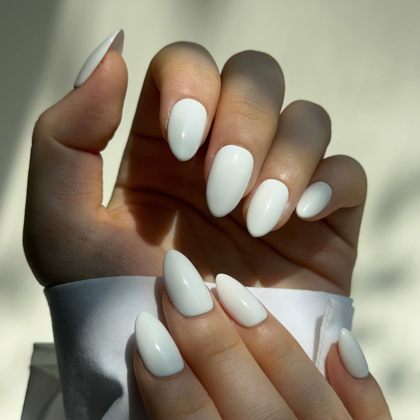 Lychee is a reusable handmade press-on nails set by Leme. The set captures the natural beauty of fresh fruit with a luminous white juicy base that evokes elegance and sophistication. Available in various short shapes, each set features our signature Macaron theme—a refined aesthetic that balances classic charm with contemporary style. Handcrafted with premium materials, these nails deliver a polished, high-quality finish that lasts. Perfect for those seeking understated luxury with a playful nod to culinary