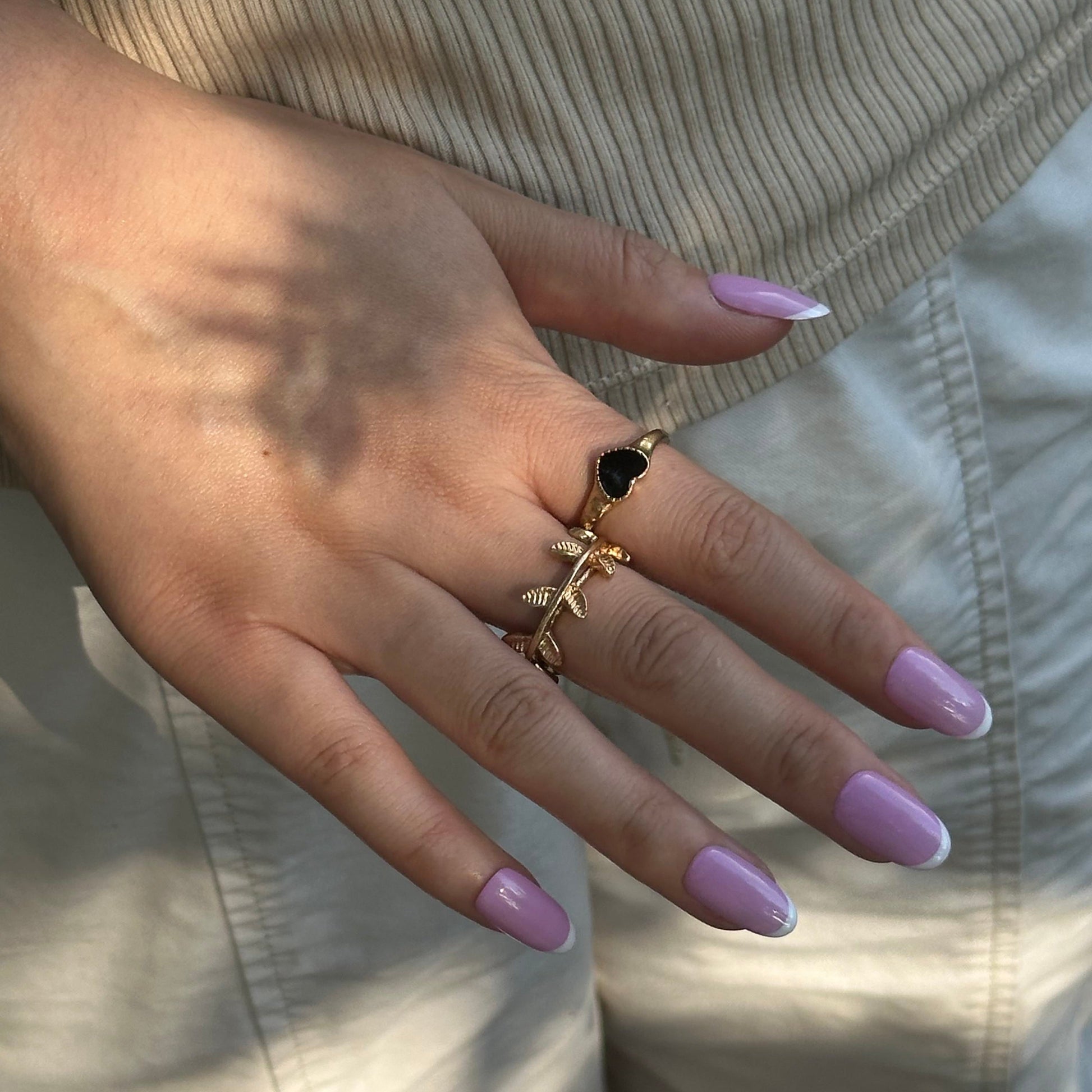 Lilac Split is a reusable handmade press-on nails set by Leme. This elegant nail design features a soft pink base complemented by crisp white French tips, offering a timeless and sophisticated look. The set comes with multiple shapes and lengths. Crafted with high-quality materials, it ensures durability and a flawless finish, perfect for both everyday wear and special occasions.
