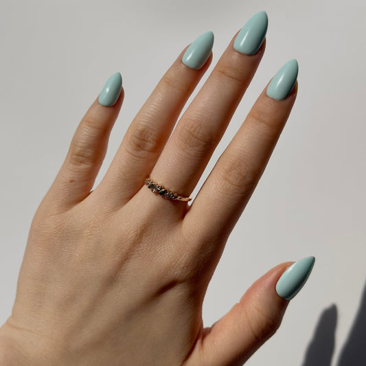 Mint is a reusable handmade press-on nails set by Leme. The set featuring a light creamy turquoise shade inspired by cool summer breezes. Available in various short shapes, this collection showcases soft macaron color tones that complements any season. Crafted with high-quality materials, each set is designed for durability and effortless application, making it perfect for everyday wear or special occasions.