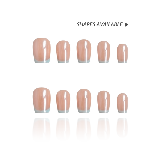 Ocean Breeze is a reusable handmade press-on nails set by Leme. Elevate your manicure with these expertly crafted press-on nails featuring a nude base and delicate baby blue French tips. The set comes with multiple shapes and lengths. Finished with a high-quality chrome sheen, this design offers a modern twist on a classic style, ensuring durability and a polished look that lasts. Perfect for those seeking subtle elegance with a contemporary edge.