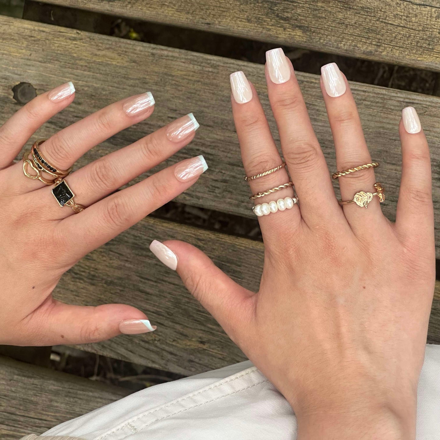 Ocean Breeze is a reusable handmade press-on nails set by Leme. Elevate your manicure with these expertly crafted press-on nails featuring a nude base and delicate baby blue French tips. The set comes with multiple shapes and lengths. Finished with a high-quality chrome sheen, this design offers a modern twist on a classic style, ensuring durability and a polished look that lasts. Perfect for those seeking subtle elegance with a contemporary edge.
