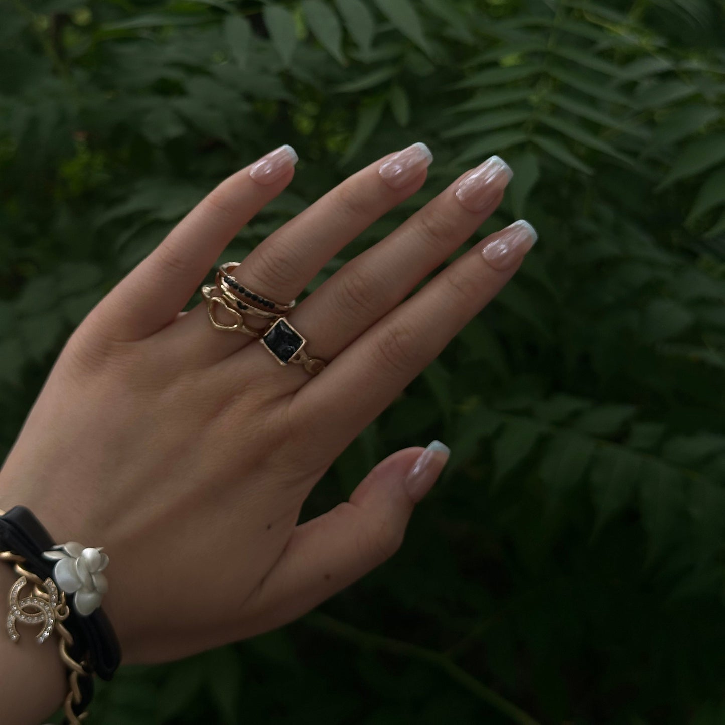 Ocean Breeze is a reusable handmade press-on nails set by Leme. Elevate your manicure with these expertly crafted press-on nails featuring a nude base and delicate baby blue French tips. The set comes with multiple shapes and lengths. Finished with a high-quality chrome sheen, this design offers a modern twist on a classic style, ensuring durability and a polished look that lasts. Perfect for those seeking subtle elegance with a contemporary edge.