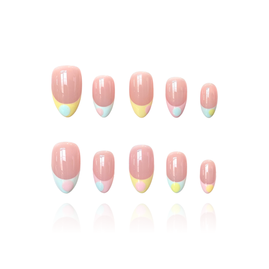 Pastel Polka is a reusable handmade press-on nails set by Leme. High-quality almond-shaped press-on nails with a soft pink nude base and playful summer aesthetic. Features pastel French tips in pink, blue, and yellow adorned with cute oversized polka dots. Perfect for adding a cheerful, on-trend look to your nails in seconds.