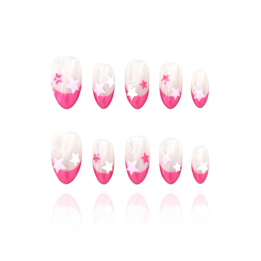Pink Blink is a reusable handmade press-on nails set by Leme. Elevate your manicure with Pink Blink, featuring expertly crafted short almond-shaped nails. The nude base provides a subtle canvas, highlighted by vibrant hot pink French tips and delicate pink star accents. This high-quality nails set offers a chic, playful look perfect for any occasion.