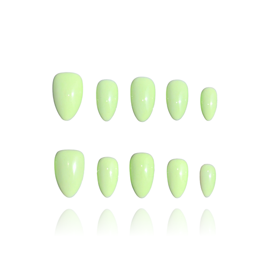 Pistachio is a reusable handmade press-on nails set by Leme. Indulge in the delicate sweetness of Pistachio—a creamy green press-on nail set inspired by the beloved macaron. It features a soft, luxurious base in rich pistachio tones, evoking the carefree spirit of summer. Available in various short shapes, these handcrafted nails blend playful charm with sophisticated elegance. Perfect for those who crave a touch of whimsy without compromising on quality. Whether you're heading to brunch or a garden party, 