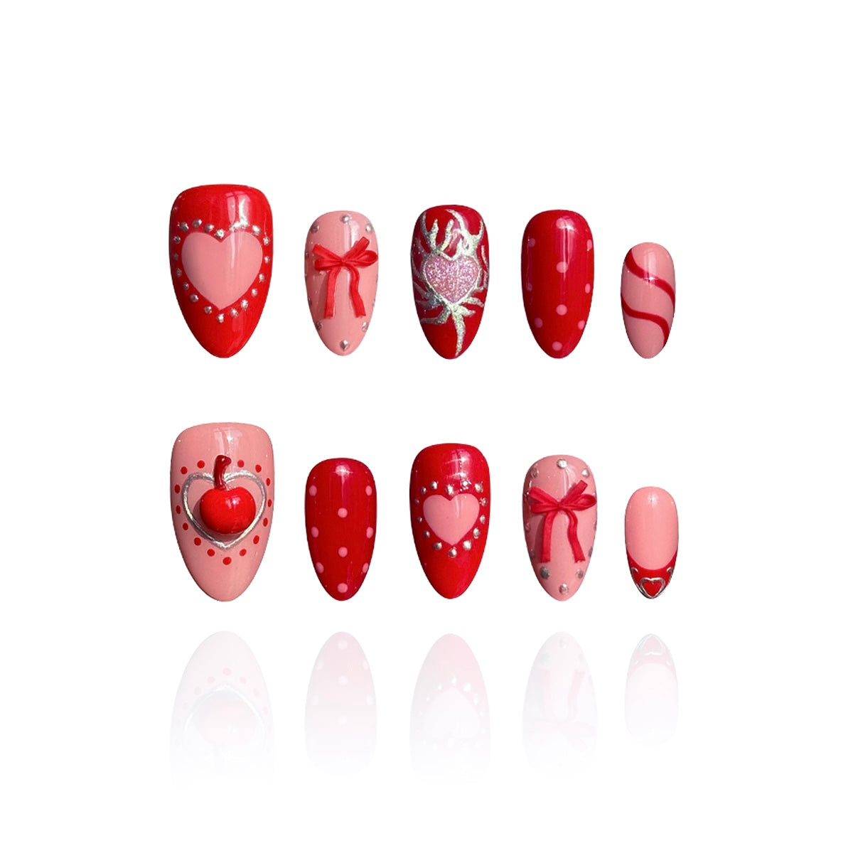 Silver Kisses is a reusable handmade press-on nails set by Leme. Elevate your Valentine's Day look with Silver Kisses, a high-quality short almond nail design from our exclusive Valentine's collection. This striking design features lustrous silver chrome accents paired with dimensional 3D cherry details, creating an eye-catching contrast. The bold palette of hot red and pink celebrates uninhibited romance and passionate self-expression. A glittering heart adorns the middle finger as the statement focal poin
