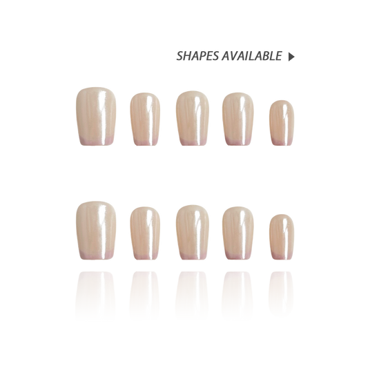 Silky Taro is a reusable handmade press-on nails set by Leme. This elegant nail design features a nude base complemented by delicate light milky purple French tips, offering a subtle yet sophisticated look. The sleek chrome finish delivers a pearl-like shine and an elegance edge. The set comes with multiple shapes and lengths. Crafted with high-quality materials. Ideal for both everyday wear and special occasions, this style balances understated elegance with a touch of color.