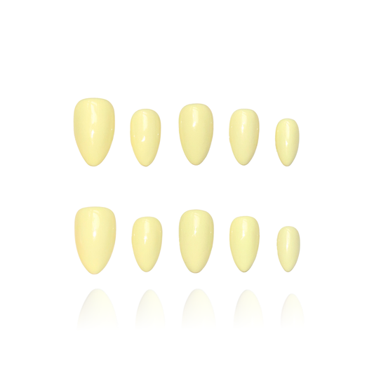 Vanilla is a reusable handmade press-on nails set by Leme. Soft, creamy vanilla tones meet playful elegance. These short-shaped nails capture a romantic macaron aesthetic—light, bright, and joyful. Handcrafted in high-quality materials, they're available in multiple short silhouettes to suit your style. Perfect for those seeking a cheerful, sophisticated look that feels both modern and timeless.