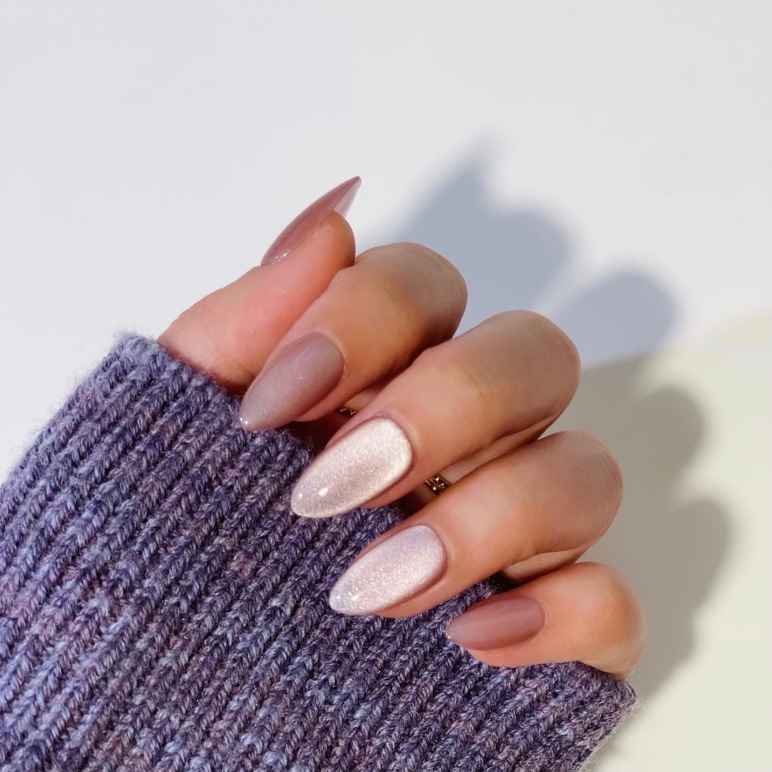Velvet Pink is a reusable handmade press-on nails set by Leme.  Elevate your look with Velvet Pink, featuring a sophisticated cat-eye design in a short almond shape. This high-quality nail polish offers a smooth, nude pink finish that complements any style with subtle elegance. Perfect for those seeking a refined yet modern manicure.