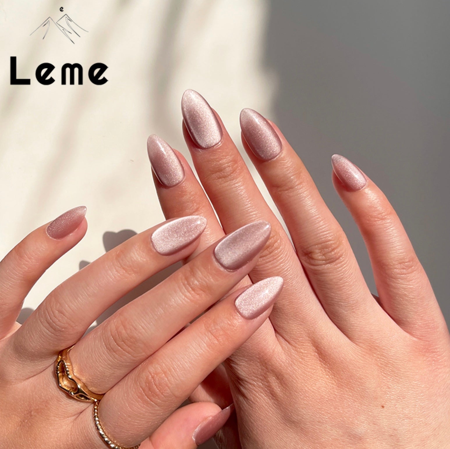 Velvet Pink is a reusable handmade press-on nails set by Leme.  Elevate your look with Velvet Pink, featuring a sophisticated cat-eye design in a short almond shape. This high-quality nail polish offers a smooth, nude pink finish that complements any style with subtle elegance. Perfect for those seeking a refined yet modern manicure.